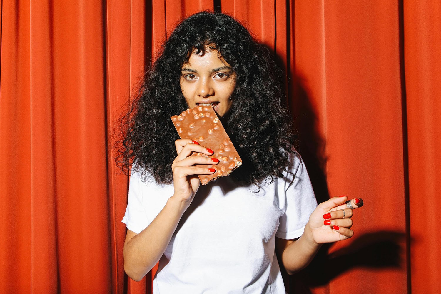 woman eating chocolate