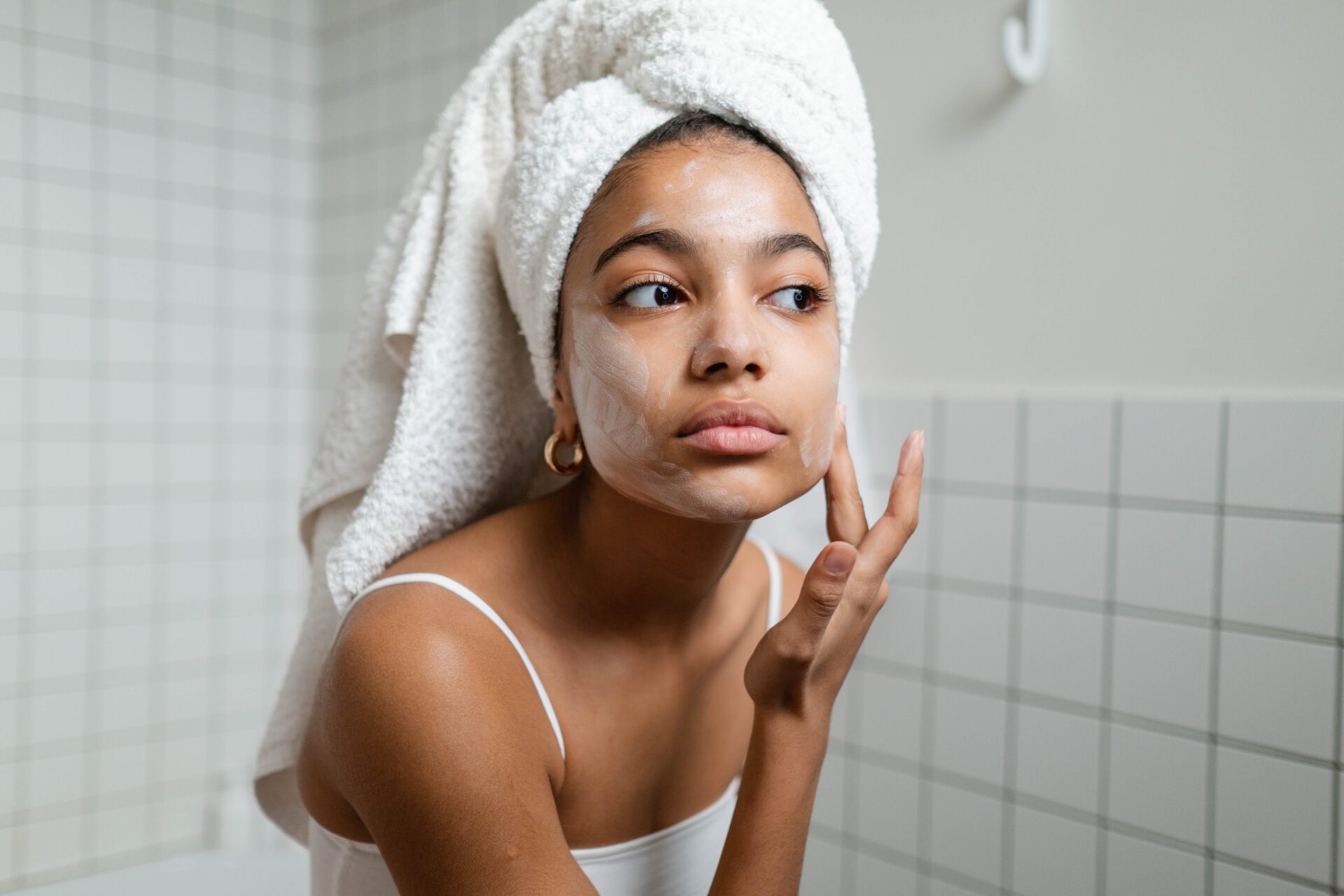 The Right Skincare Routine for Your Skin Type 2 woman doing skincare for her skin type