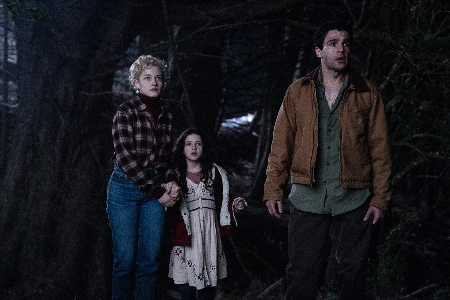 3 actors standing outside in scene from Wolf man film