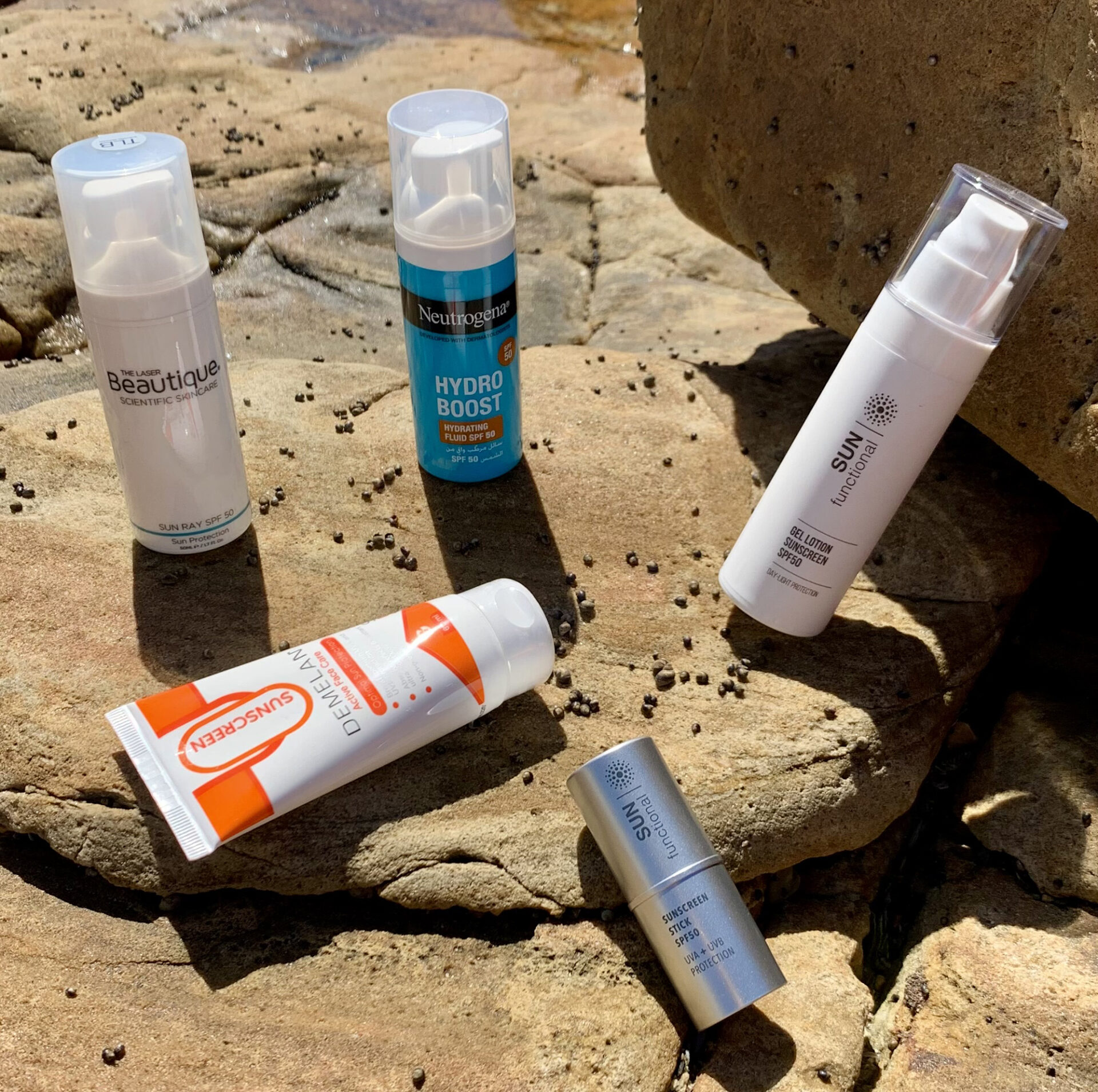 sunscreen products on the beach