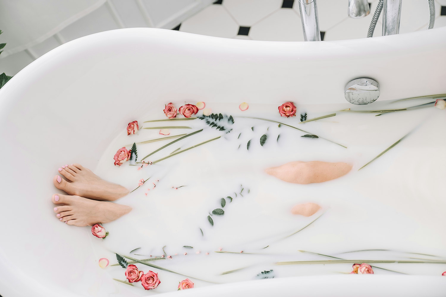 woman in bath doing self-care