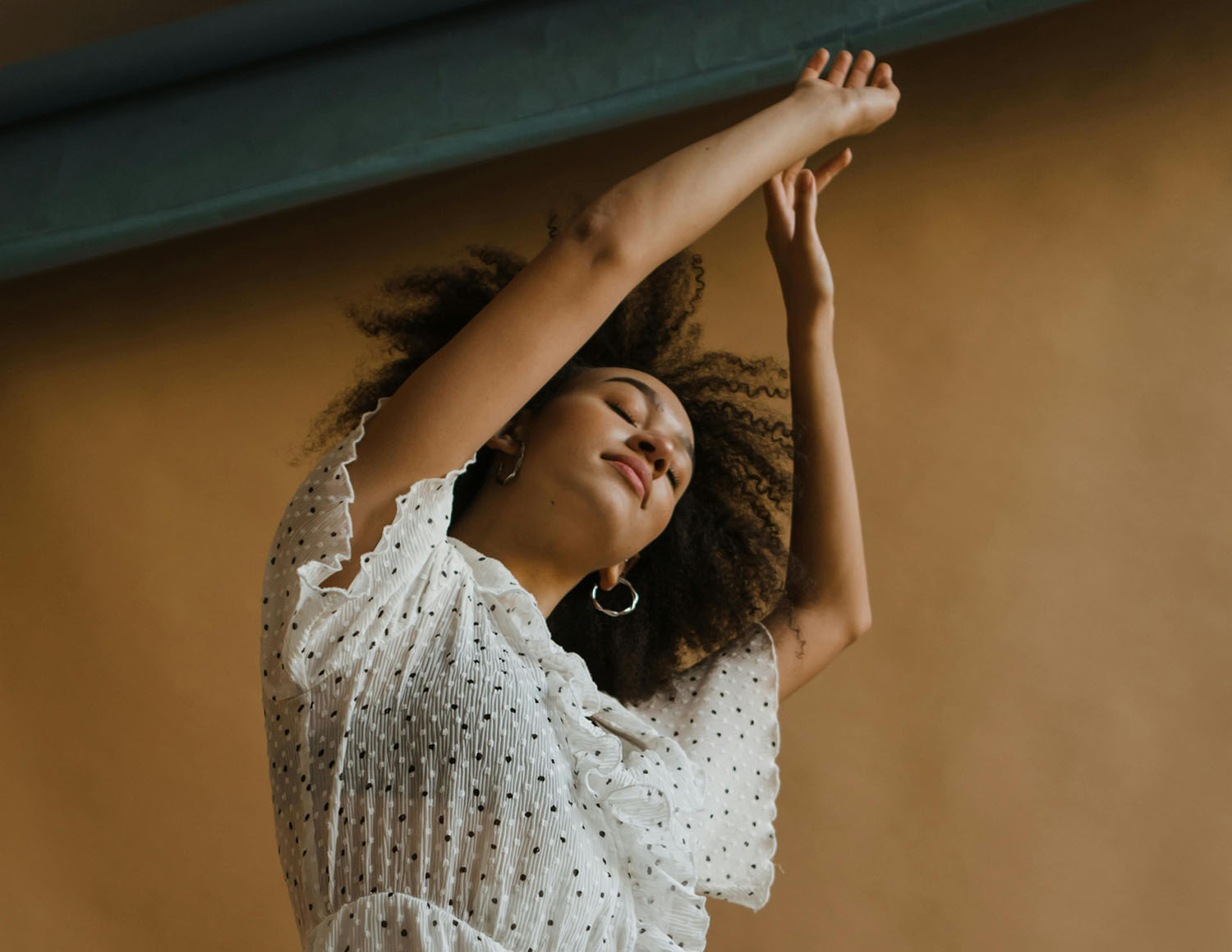 woman celebrating February 2025 winners