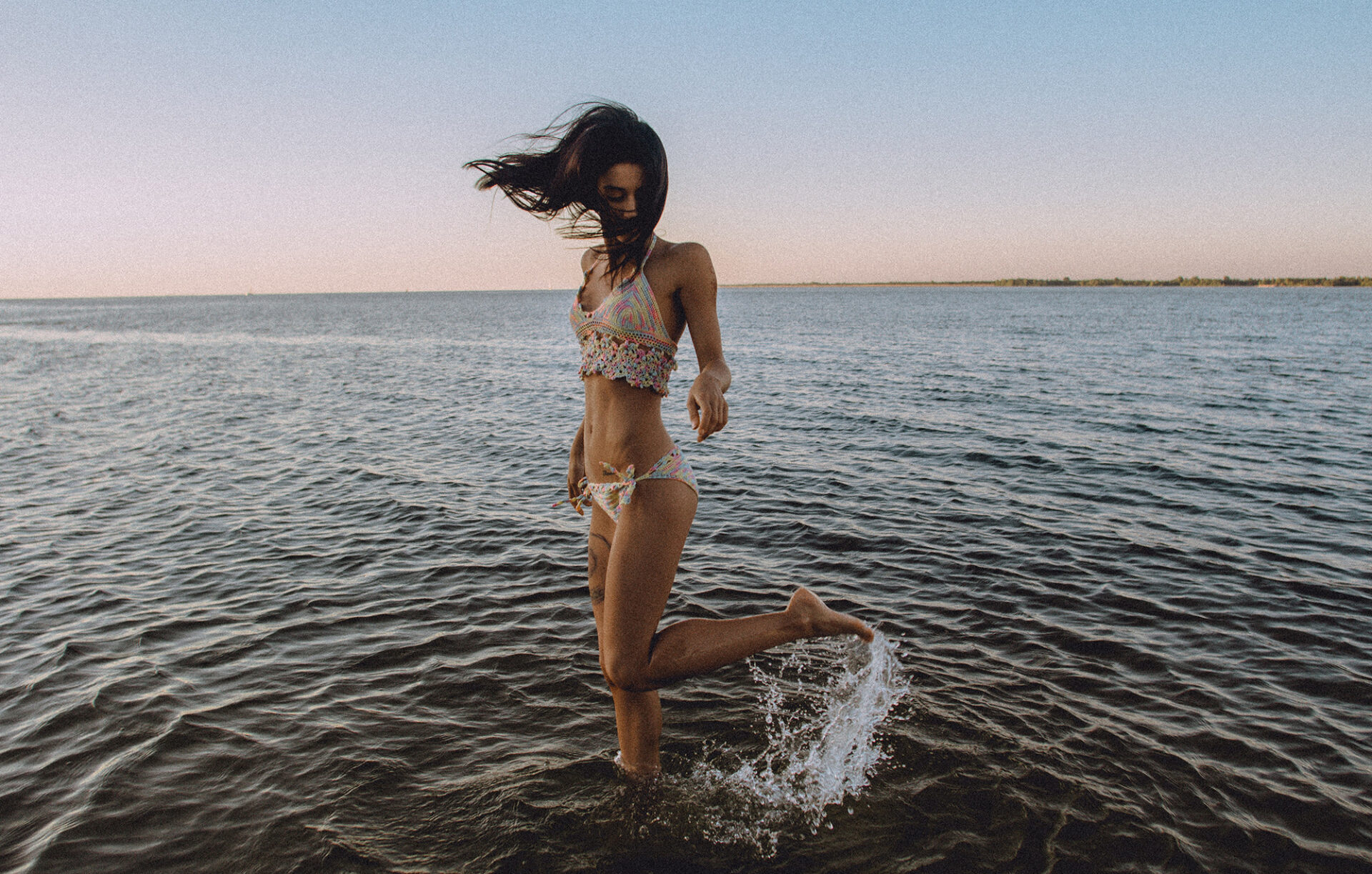 End-of-summer favourite beauty products 1 girl on beach in bikini promoting beauty