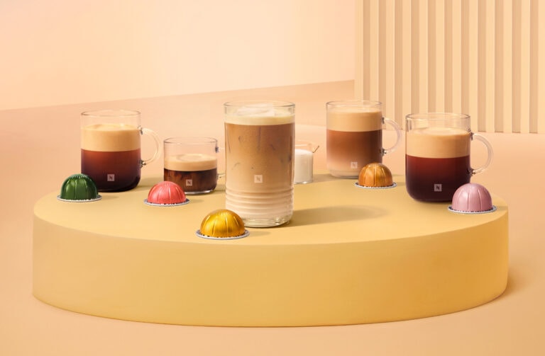 Colorful coffee capsules and drinks display