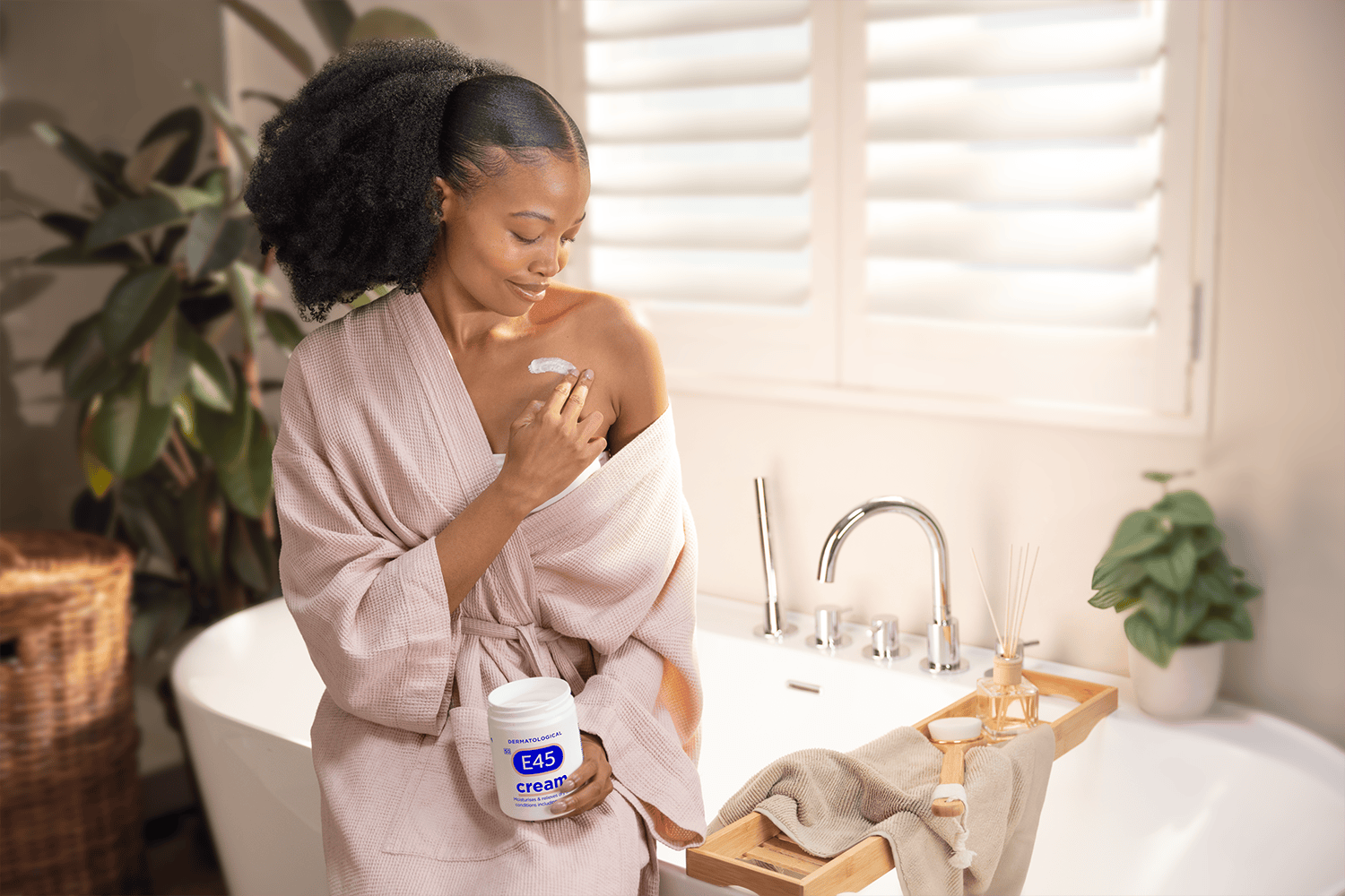 Woman applying E45 Cream